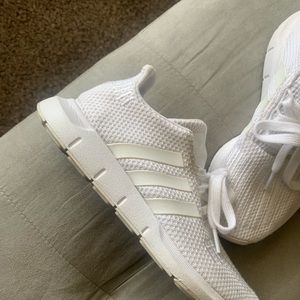 White adidas size 4 in kids or 6.5 in womens
